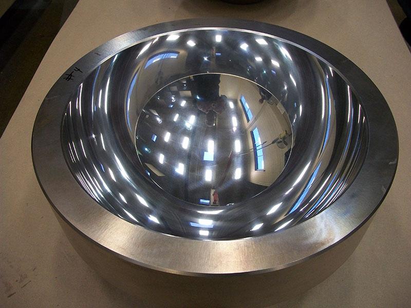 A Stainless Steel 316L (CF3M) based pintle bushing cup that holds a pintle ball, providing motion buffering that allows large bridges to safely sway and flex.